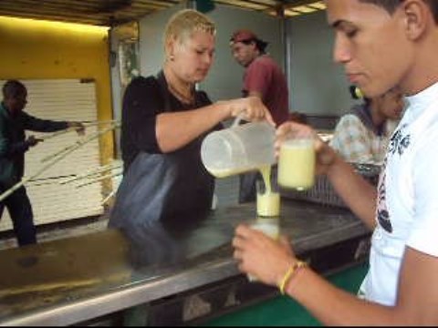 making guarapo at stand in havana cuba